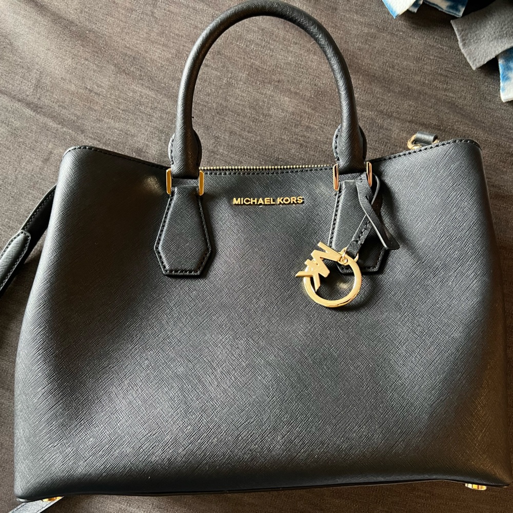 Michael Kors black tote in black with gold hardware new never used